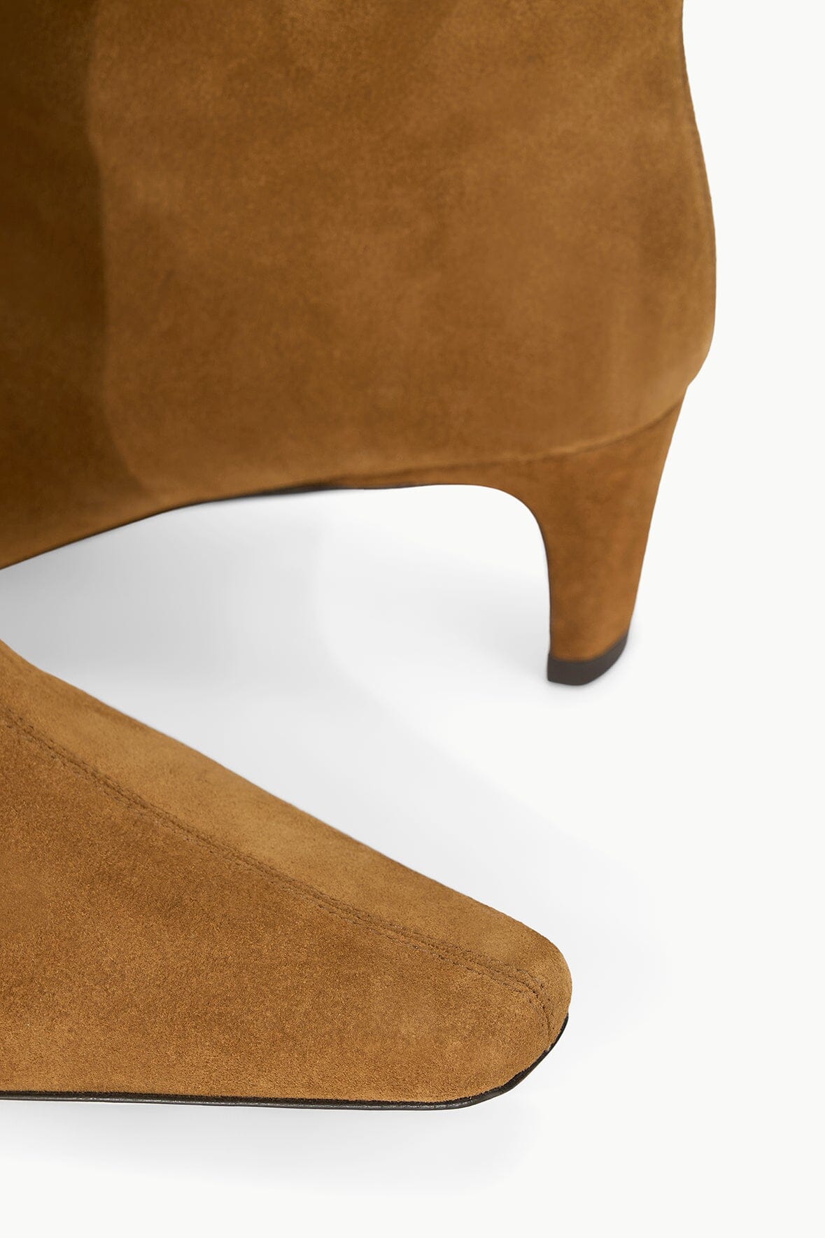 Tan suede boot heel and toe view, showing low block heel