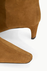 Tan suede boot heel and toe view, showing low block heel