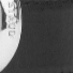 Close-up of black belt buckle with silver ring hardware