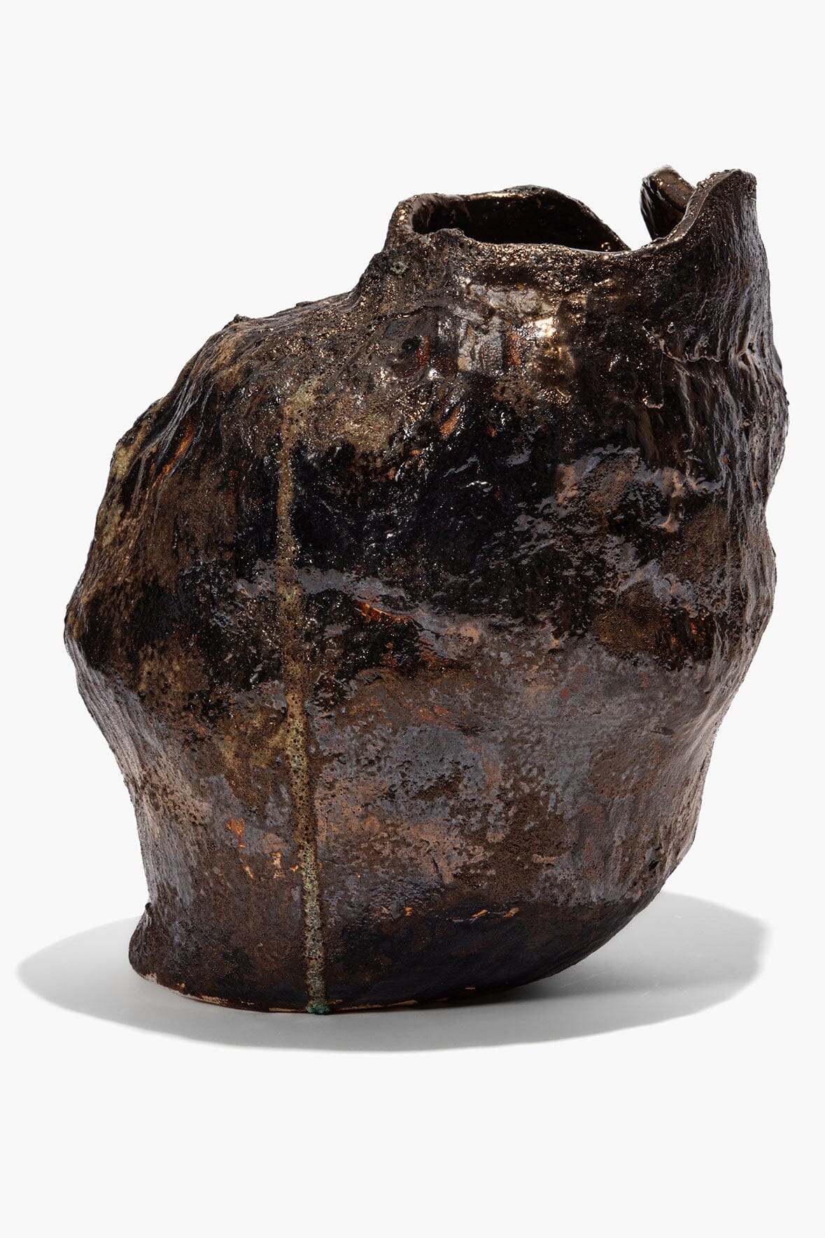Organic ceramic vase in dark earth glaze, irregular shape and wide mouth