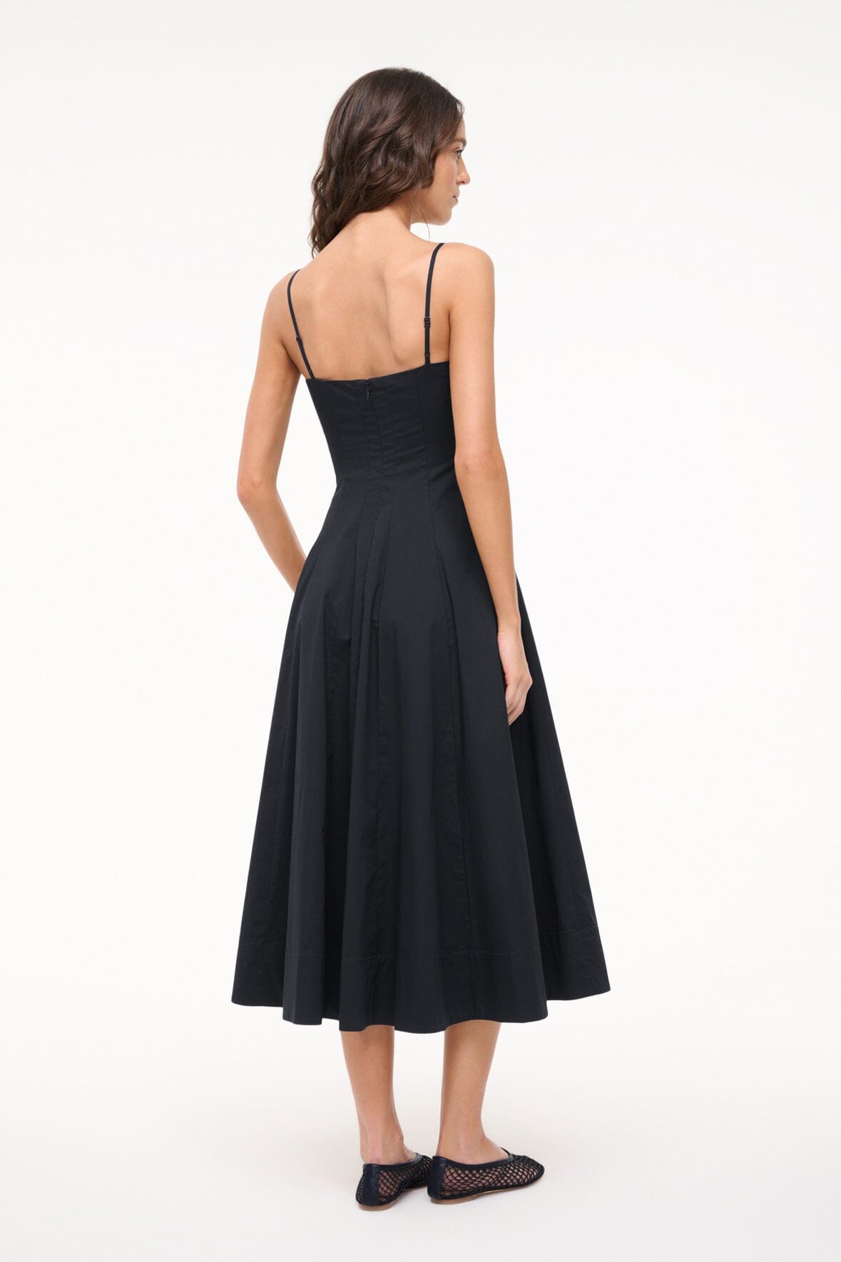 Black spaghetti-strap midi dress with exposed back and fitted bodice