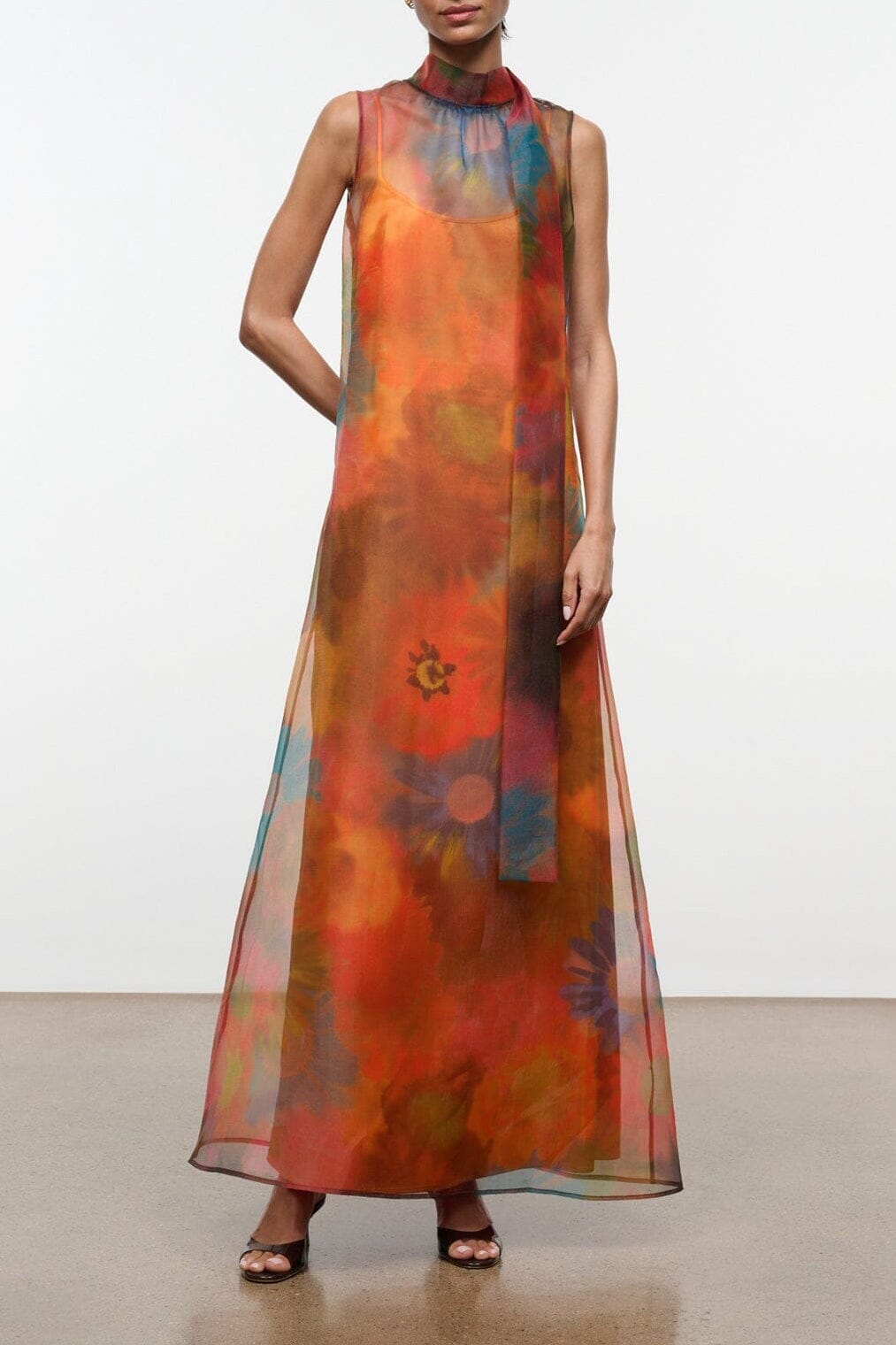 Sleeveless maxi dress with high neck, orange-blue tie-dye sheer overlay