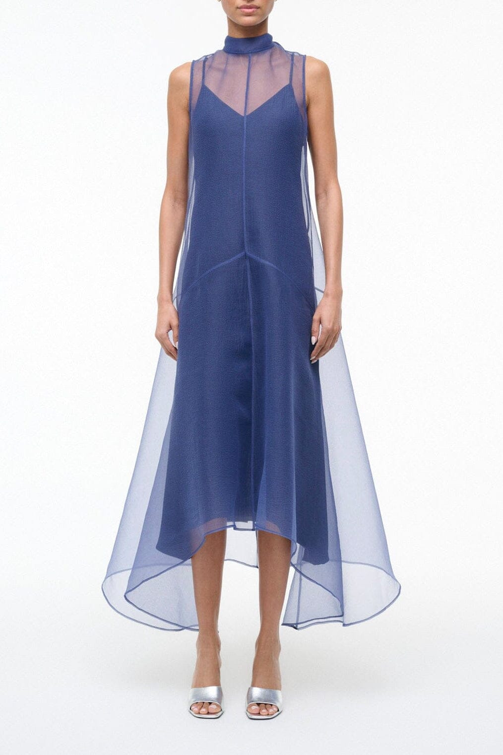 Navy sleeveless midi dress with high neckline and sheer overlay