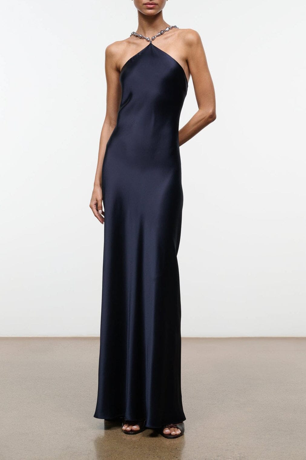 Navy halter satin maxi dress with thin neck tie straps