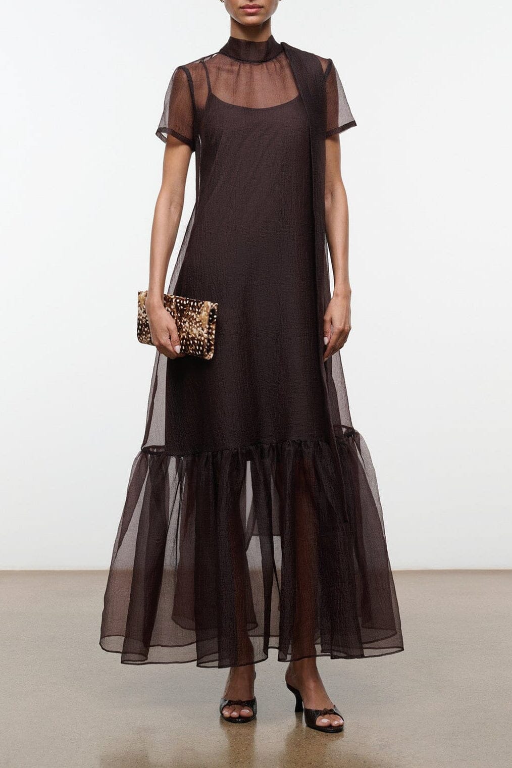 Dark brown mesh maxi dress with mock neck, short sleeves, and tiered tulle hem