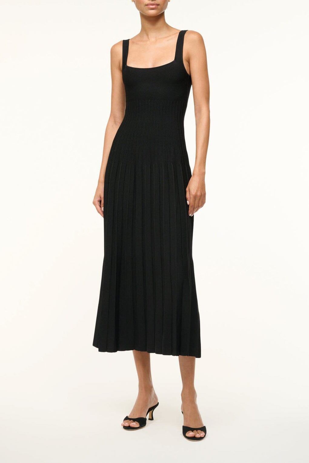 Black sleeveless midi dress with square neckline and gathered, pleated skirt