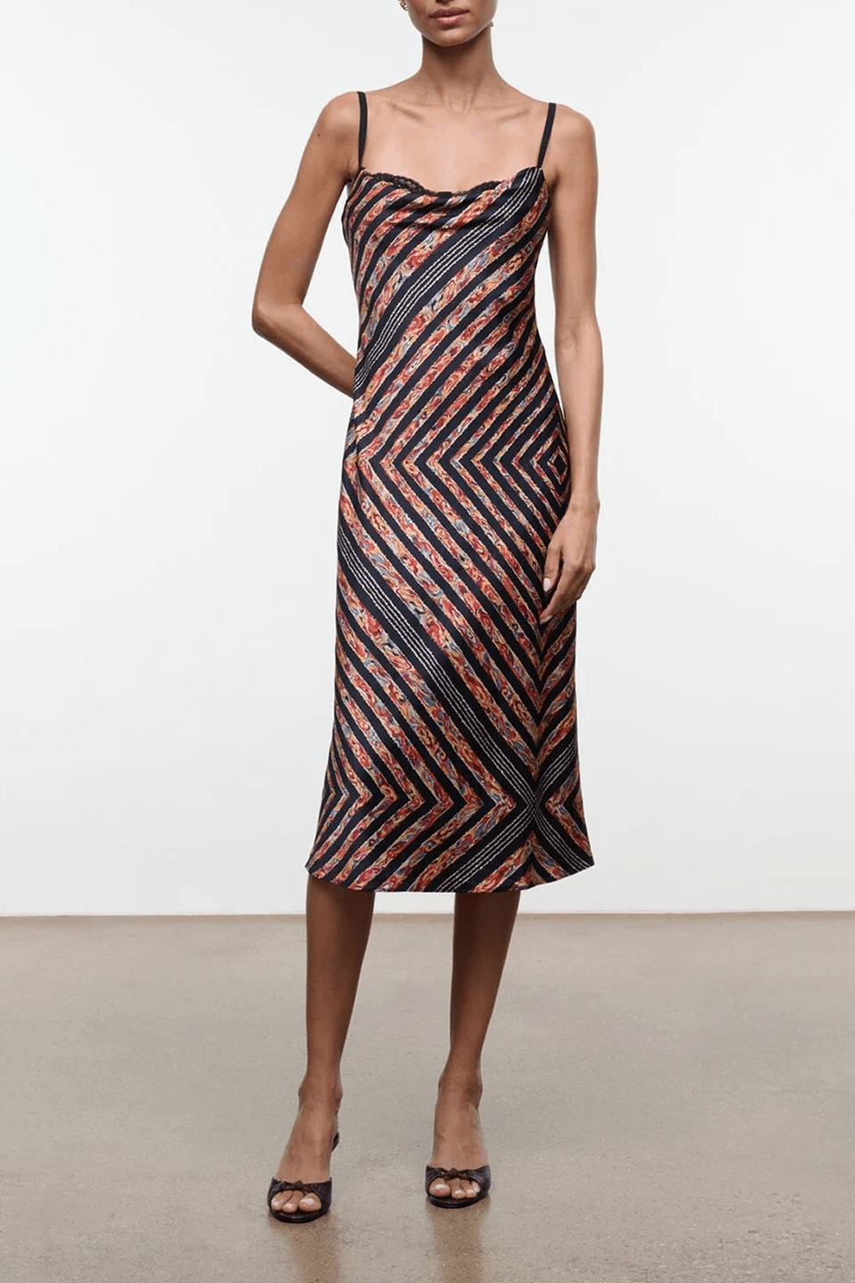 Sleeveless silk midi dress with multicolor chevron stripe print and V-neckline