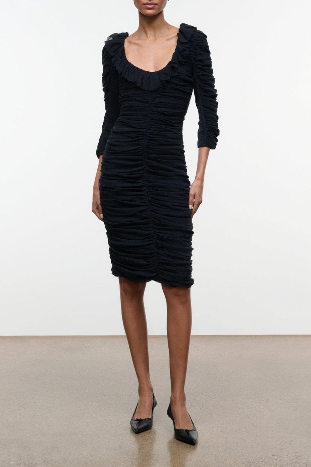 Gretta black ruched midi dress with gathered shoulders and three-quarter sleeves