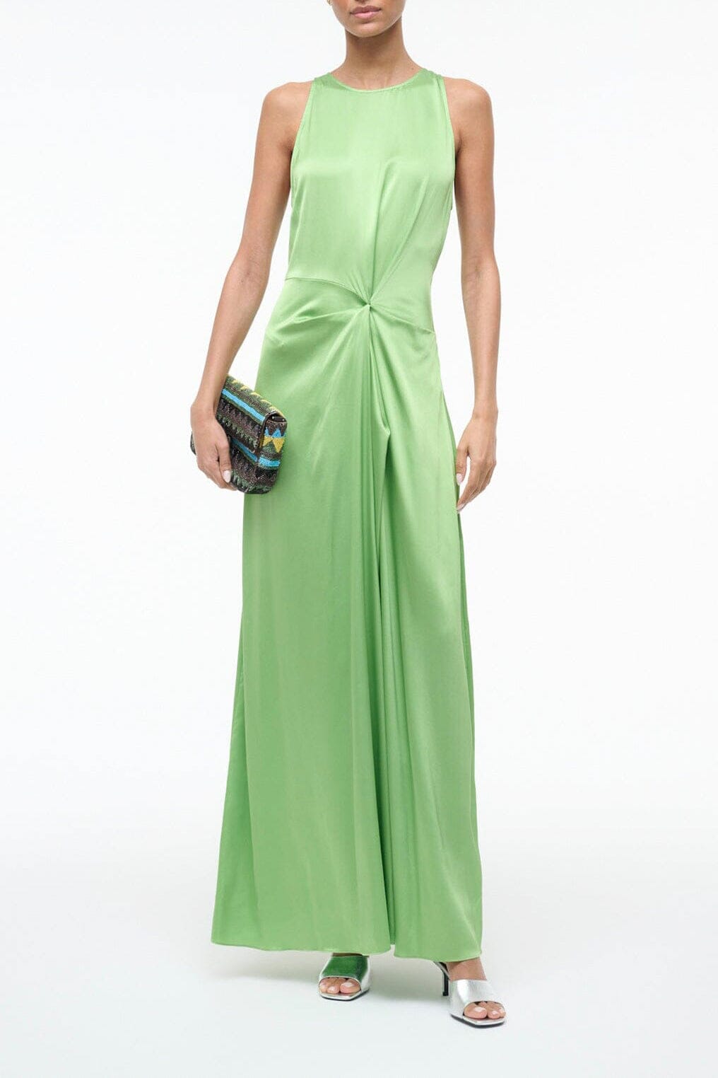 Sleeveless green silk maxi dress with gathered waist and round neckline