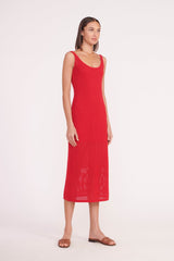 Red sleeveless midi shift dress with scoop neckline and straight hem.
