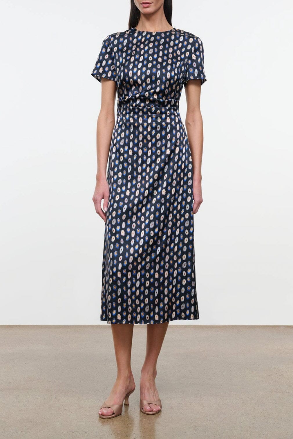 Navy patterned silk dress with short sleeves and tied waist, midi length