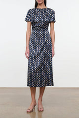 Navy patterned silk dress with short sleeves and tied waist, midi length