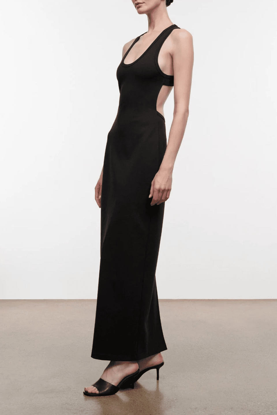 Black sleeveless maxi dress with wide scoop neckline and fitted column silhouette