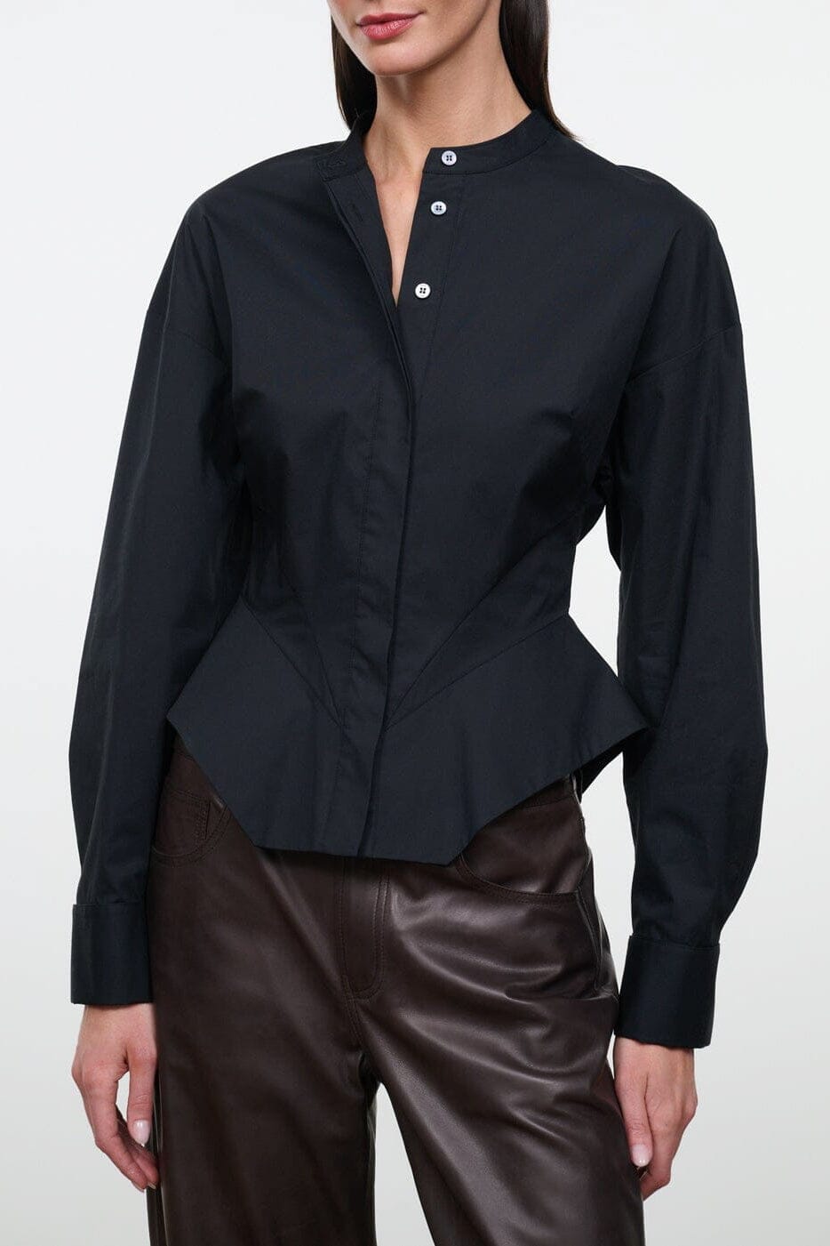 Black long-sleeve button-front top with short stand collar