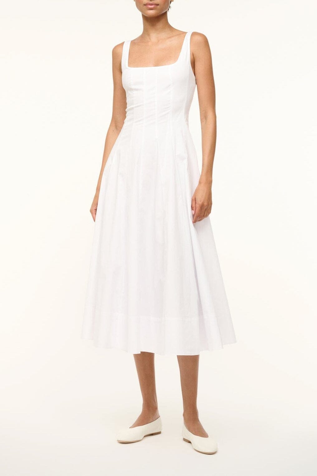 White sleeveless midi dress with square neckline and pleated bodice