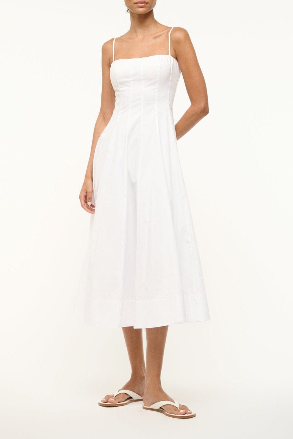 Wylie sleeveless white midi dress with square neckline and fitted waist